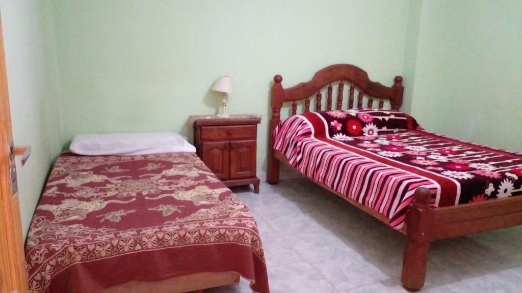 מיטה או מיטות בחדר ב-La Coplera