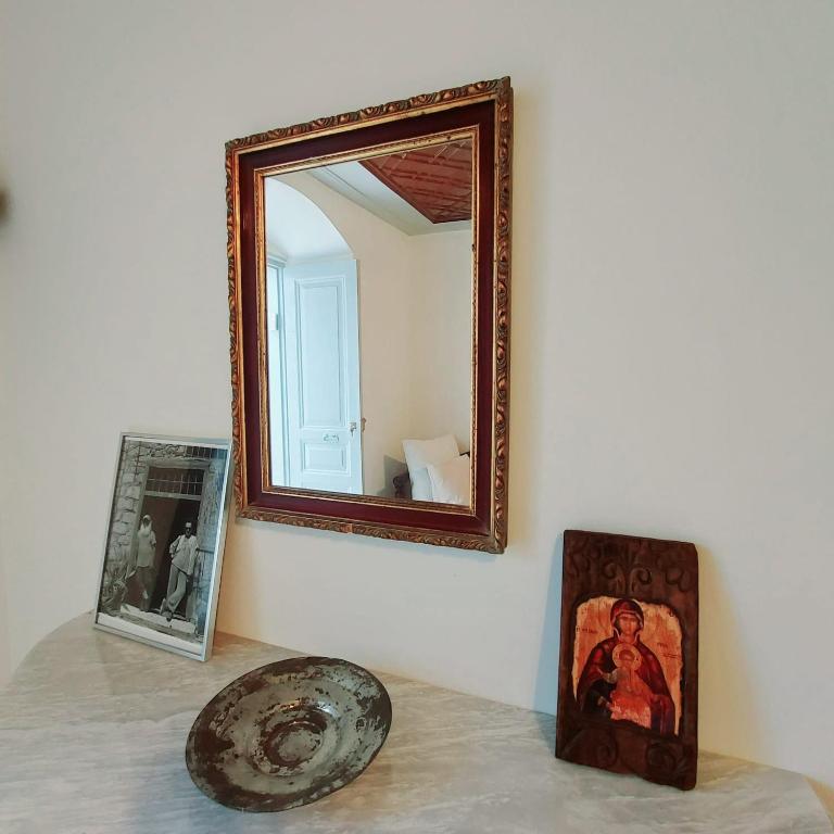 Postel nebo postele na pokoji v ubytování Danaë Port House