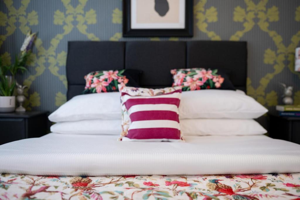 Postel nebo postele na pokoji v ubytování Leaba B&B