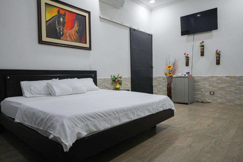 Katil atau katil-katil dalam bilik di Club Rey Pez Espinal