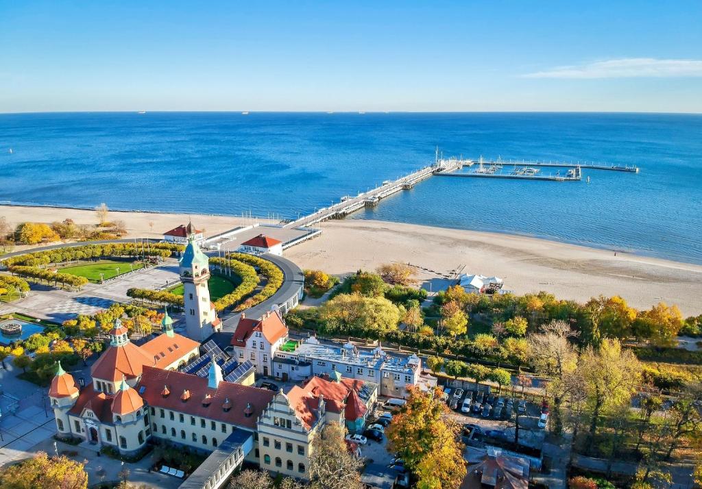 an aerial view of a resort near the ocean at So in Sopot Station in Sopot