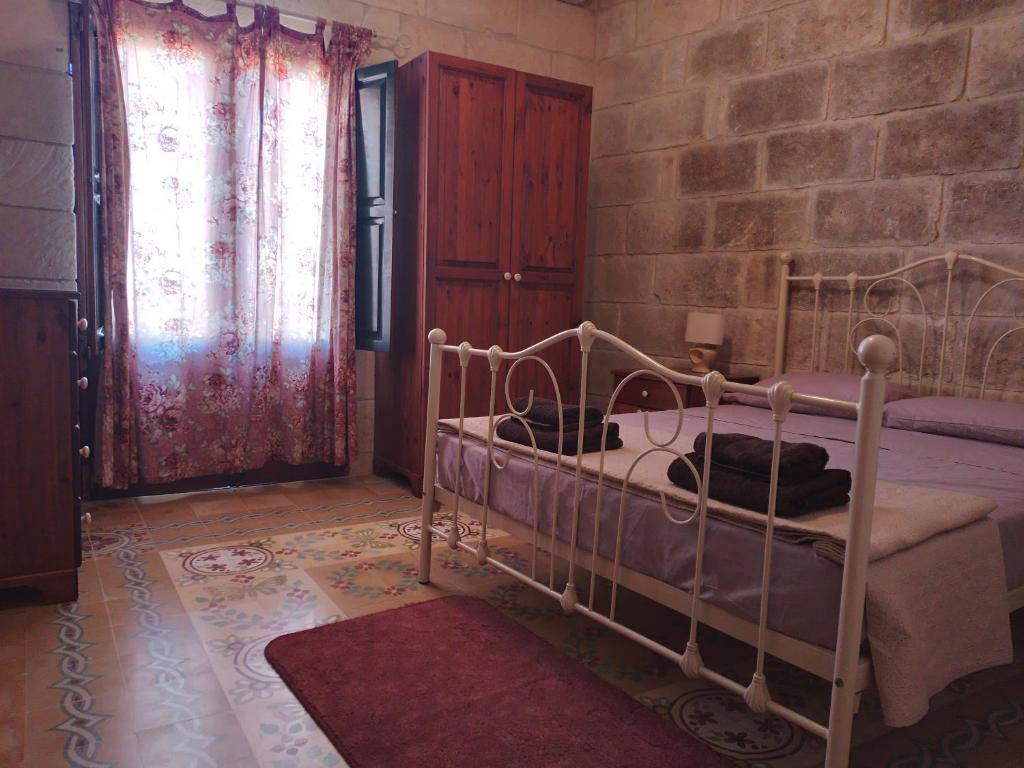 Postel nebo postele na pokoji v ubytování Geligiz Farmhouse