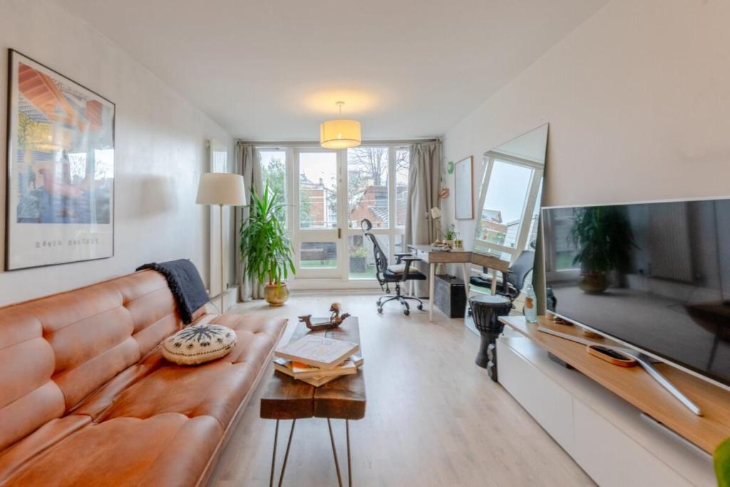 Et sittehjørne på Stunning 1BD Flat w Garden area Kentish Town!