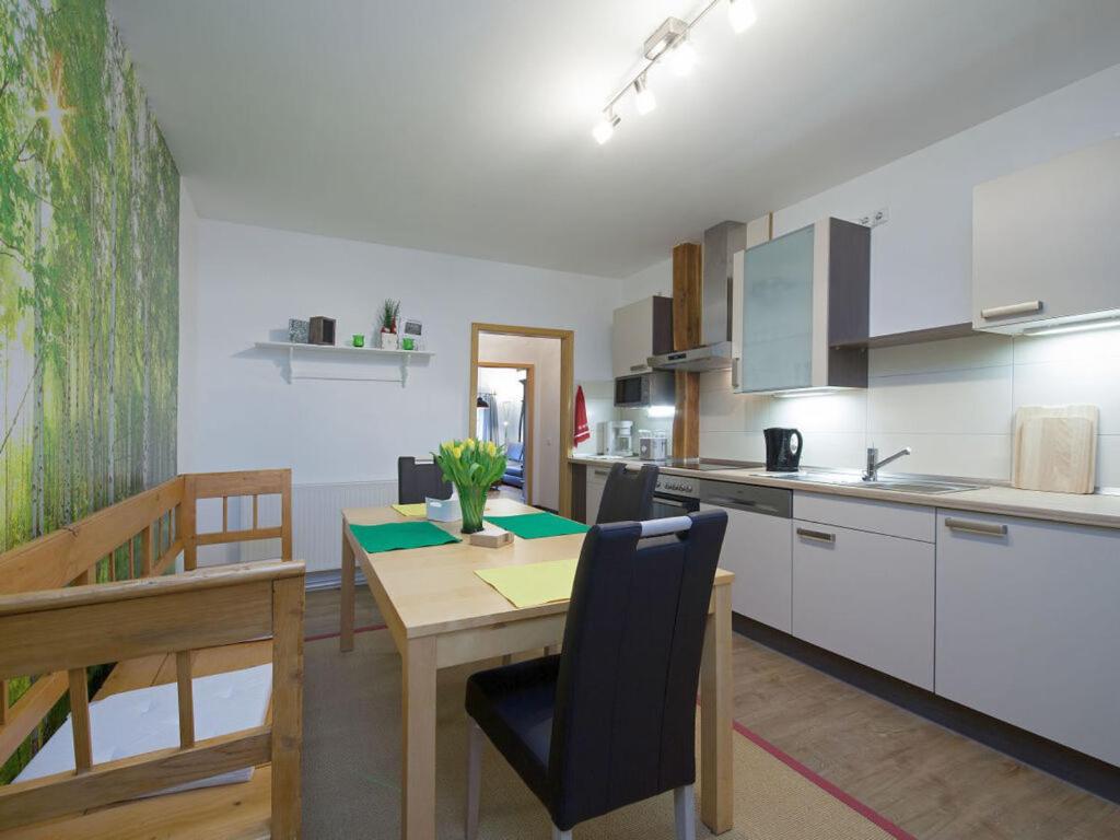 Kjøkken eller kjøkkenkrok på Holiday apartment Alpakahof Blomberg