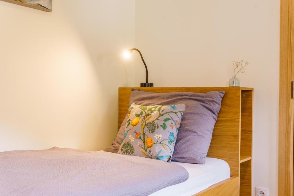 Postel nebo postele na pokoji v ubytování Julias Guesthouse