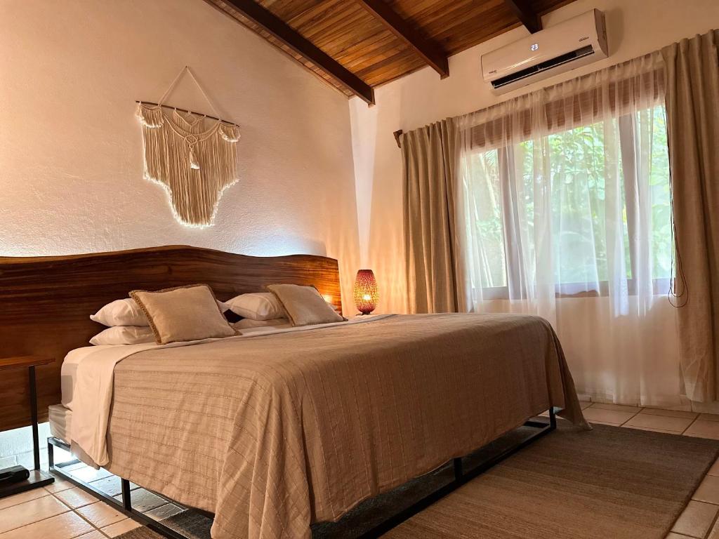 Postel nebo postele na pokoji v ubytování Curiol Boutique Hotel & Lounge