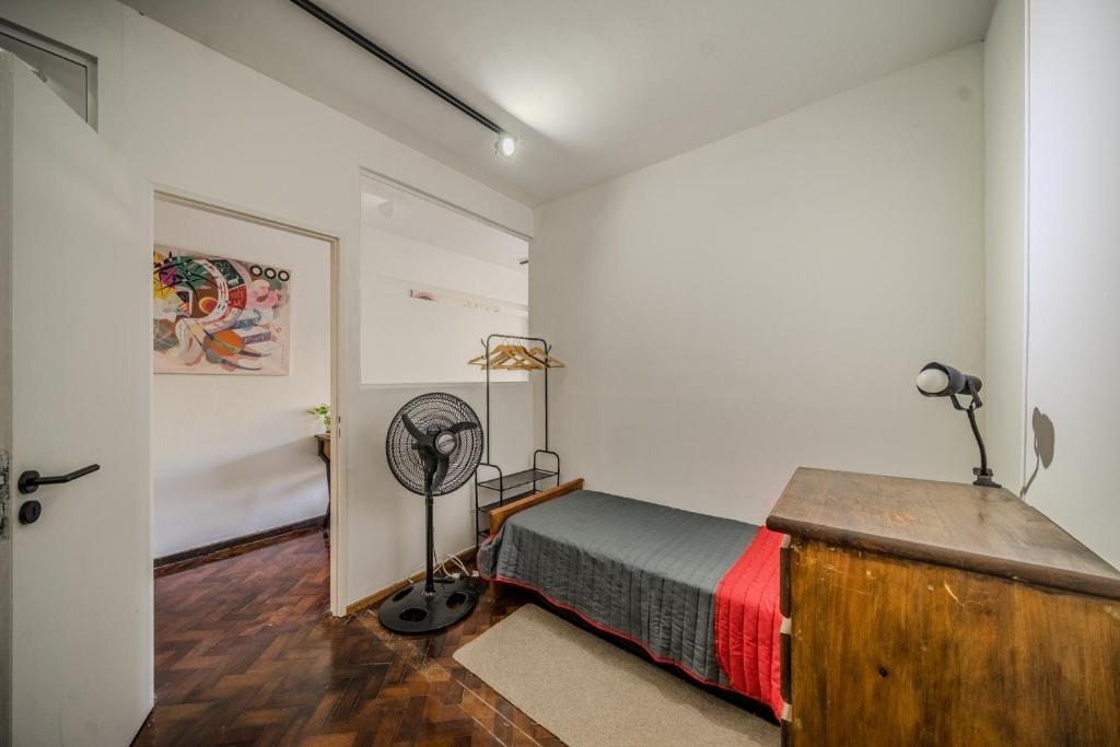 Giường trong phòng chung tại Hermoso Departamento con Balcon al Obelisco I