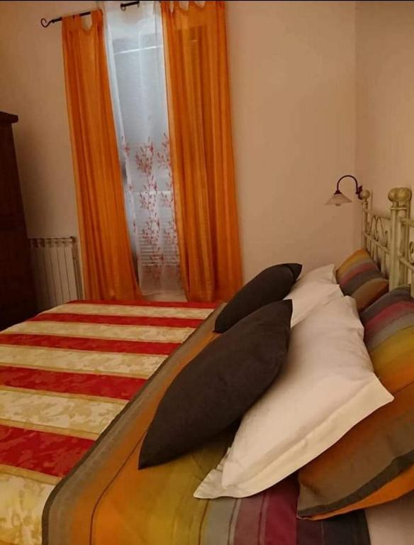 Postel nebo postele na pokoji v ubytování Affittacamere ALBA FIORITA
