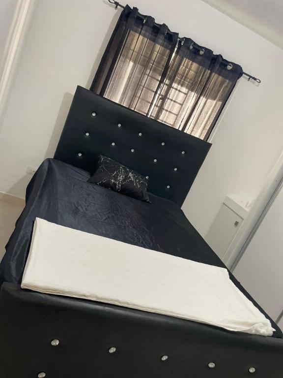 Postel nebo postele na pokoji v ubytování Tranquilo apartamento cercano al aeropuerto