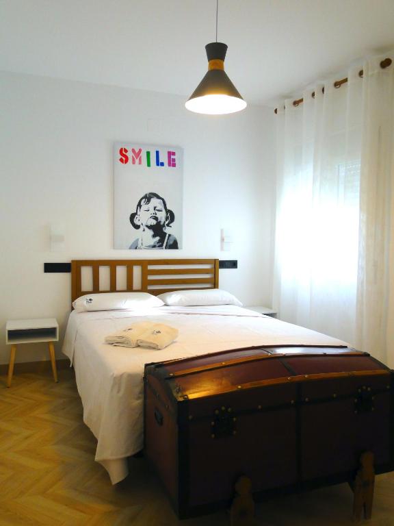 Postel nebo postele na pokoji v ubytování Almagro Suite-A un paso