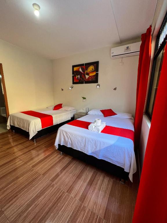 Postel nebo postele na pokoji v ubytování Residencial Marina House