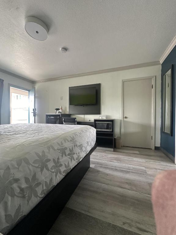 Postel nebo postele na pokoji v ubytování Signature Inn Winnemucca