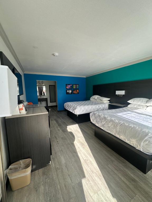 Postel nebo postele na pokoji v ubytování Signature Inn Winnemucca