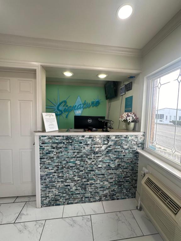 Kuchyň nebo kuchyňský kout v ubytování Signature Inn Winnemucca