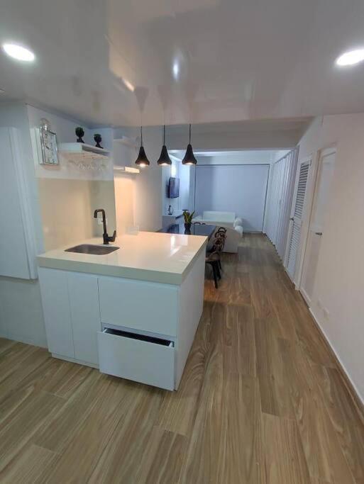 Kuchyň nebo kuchyňský kout v ubytování Apartamentos Top Hansa Alfrente de la playa