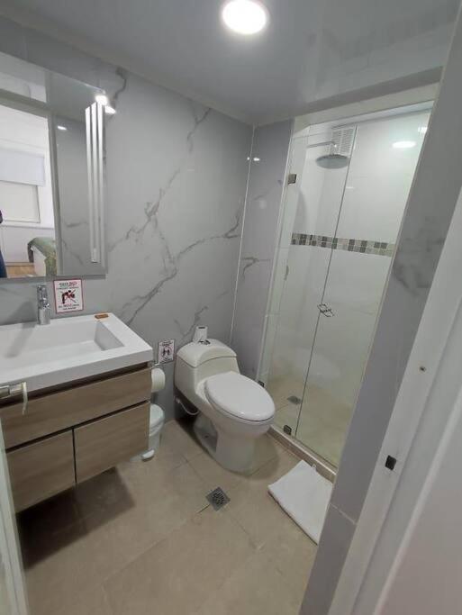 Koupelna v ubytování Apartamentos Top Hansa Alfrente de la playa