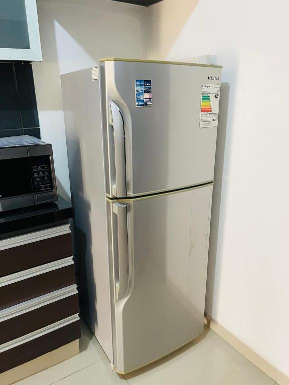 Kuchyň nebo kuchyňský kout v ubytování Monoambiente amplio y cómodo Oasis