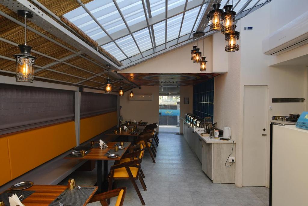 Kuchyň nebo kuchyňský kout v ubytování Bay Breeze Suites