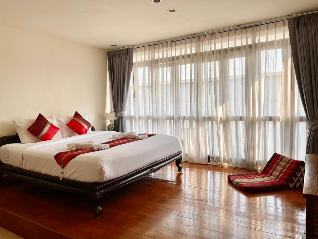 Rustic Guest House tesisinde bir odada yatak veya yataklar