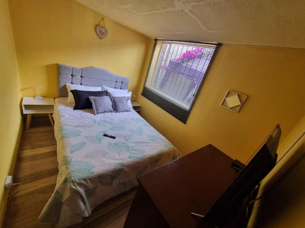 Postel nebo postele na pokoji v ubytování Casa Dohko
