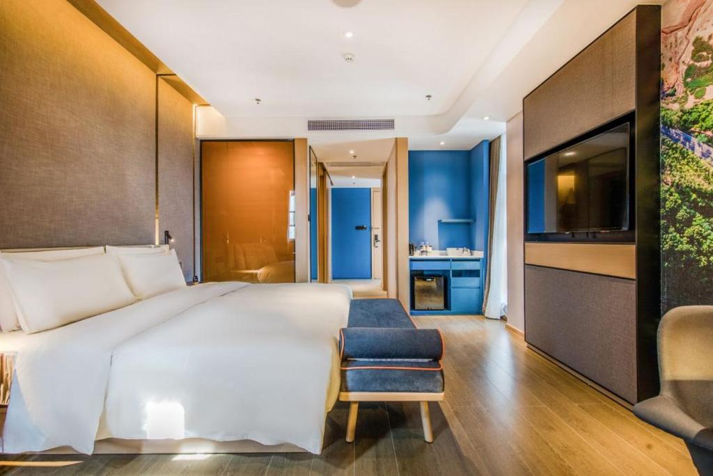 Postel nebo postele na pokoji v ubytování Atour Hotel Zhongshan Tanzhou