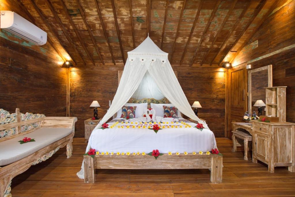 Letto o letti in una camera di The Meranggi