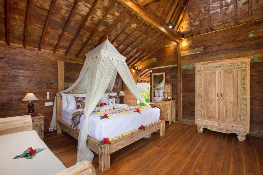 Letto o letti in una camera di The Meranggi