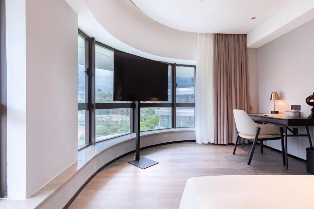 TV a/nebo společenská místnost v ubytování Atour Hotel Zhaoqing Qixingyan