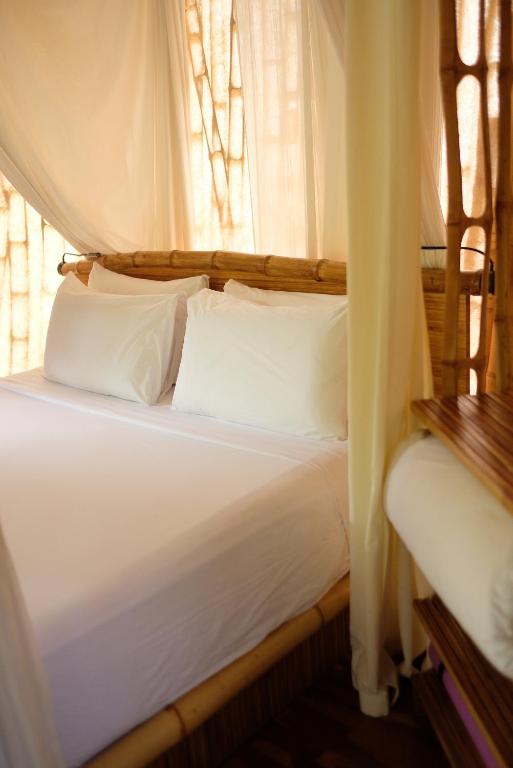 Voodi või voodid majutusasutuse Maringi Sumba by the Sumba Hospitality Foundation toas