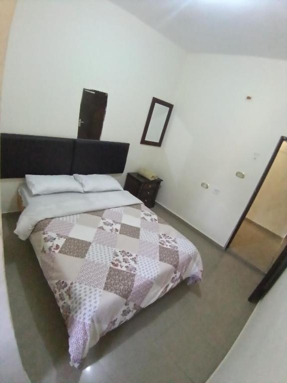 Postel nebo postele na pokoji v ubytování Petra Gate Hotel