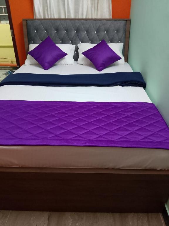 Postel nebo postele na pokoji v ubytování SD Residency - Yercaud