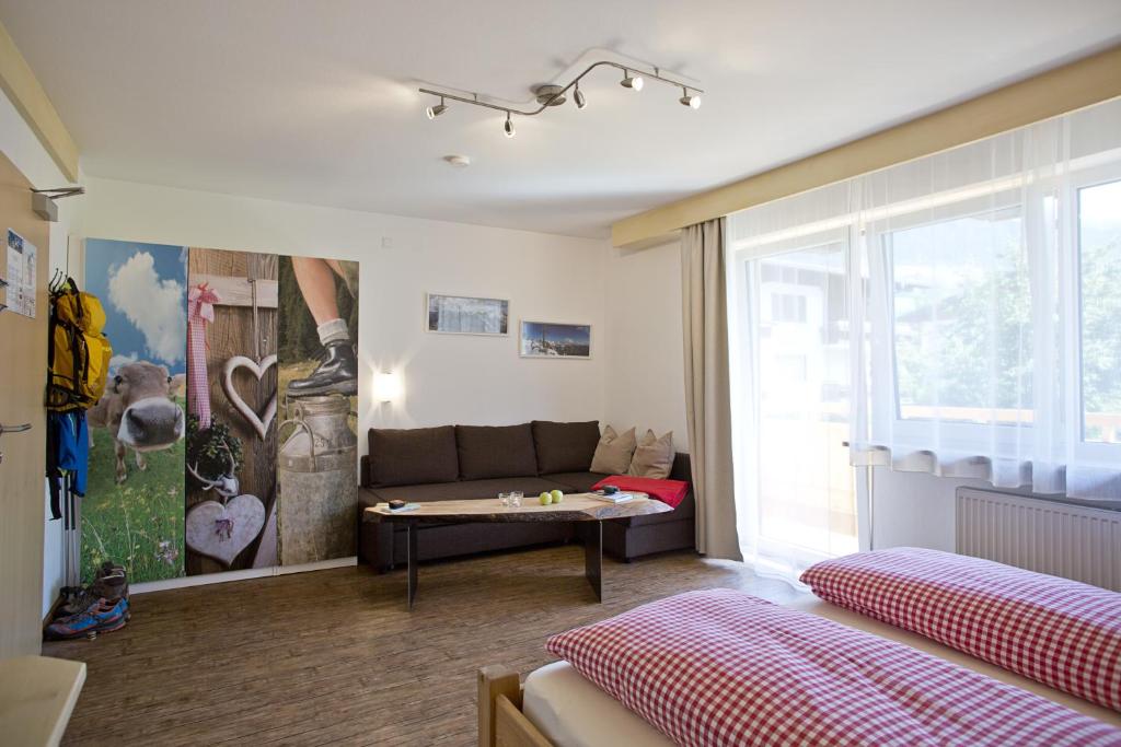 A seating area at Alphotel Mittersill # inklusive Sommercard #