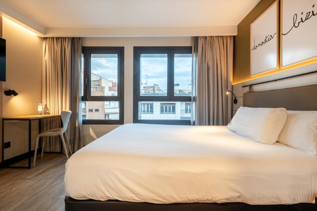 Postel nebo postele na pokoji v ubytování Leonardo Boutique Hotel San Sebastián