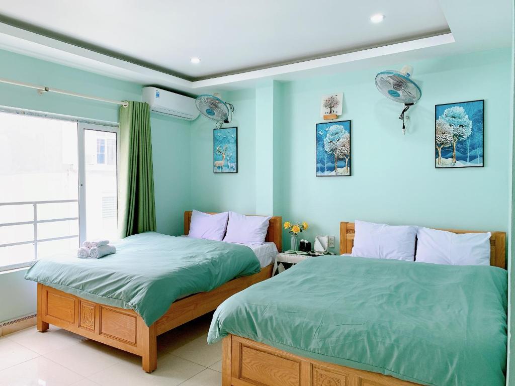 Giường trong phòng chung tại Bao Long Guest House