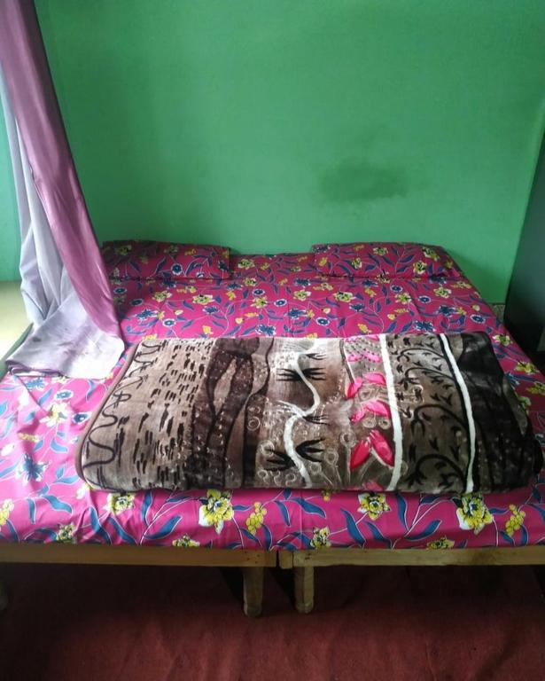 Postel nebo postele na pokoji v ubytování OYO Kuldeep Home Stay