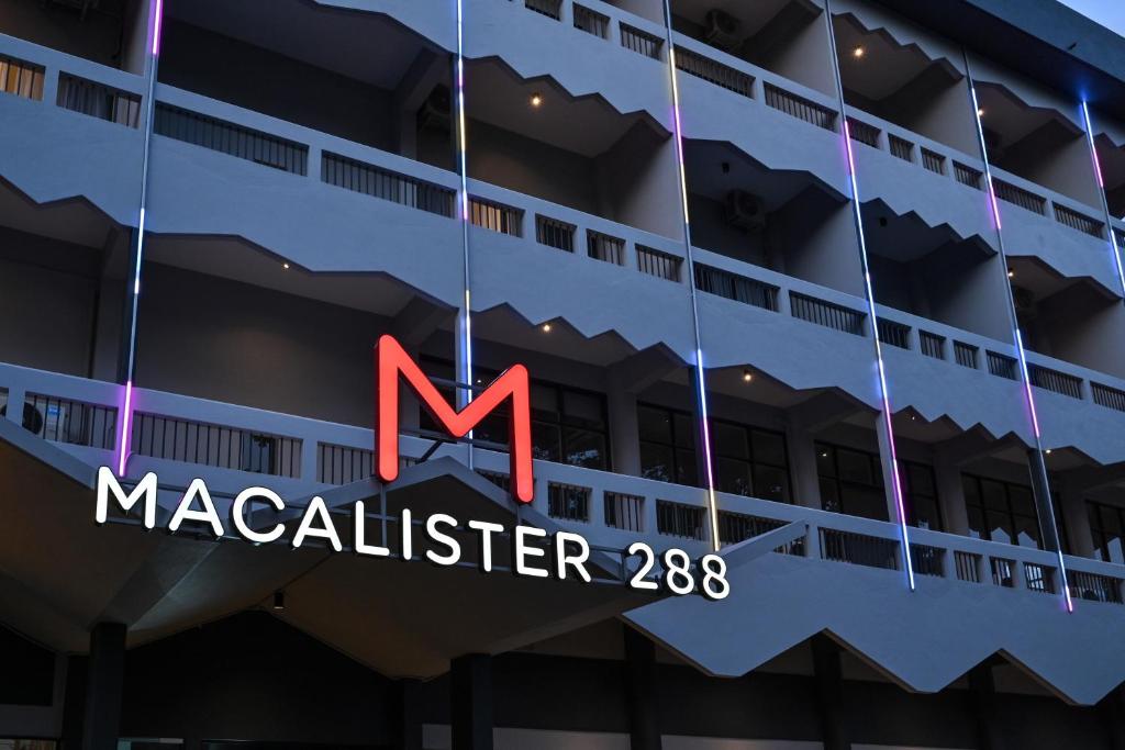 a sign for a m macalleiselier building at Macalister 288 in George Town