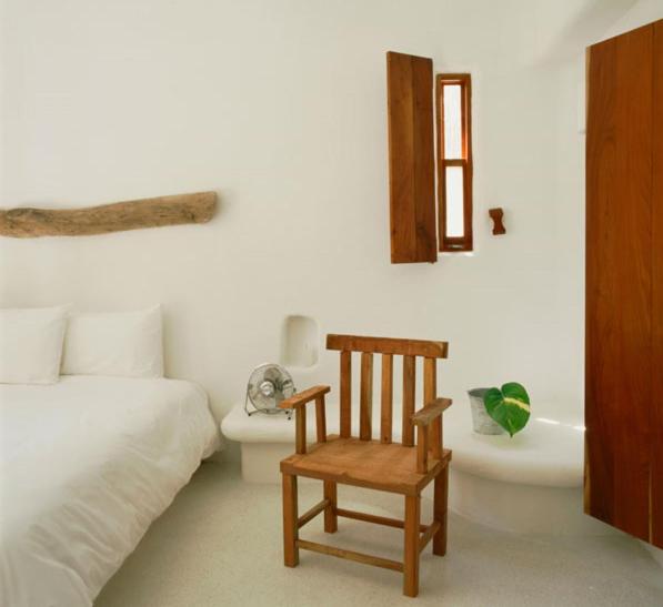 Postel nebo postele na pokoji v ubytování Hotel Azucar, Monte Gordo, a Member of Design Hotels