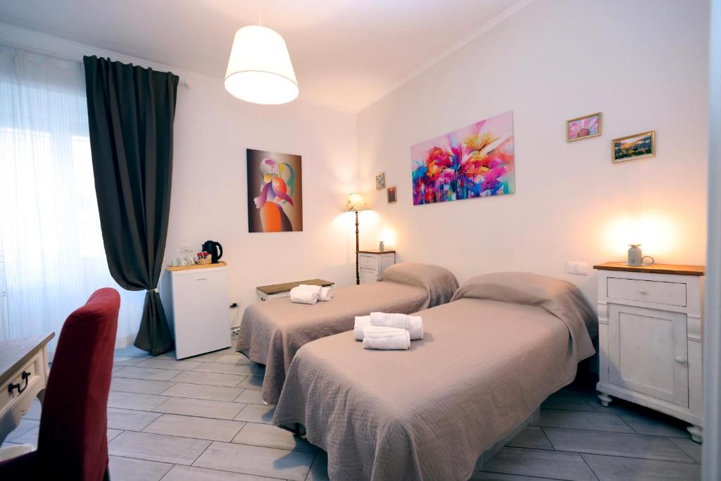 A bed or beds in a room at Sivory Rome