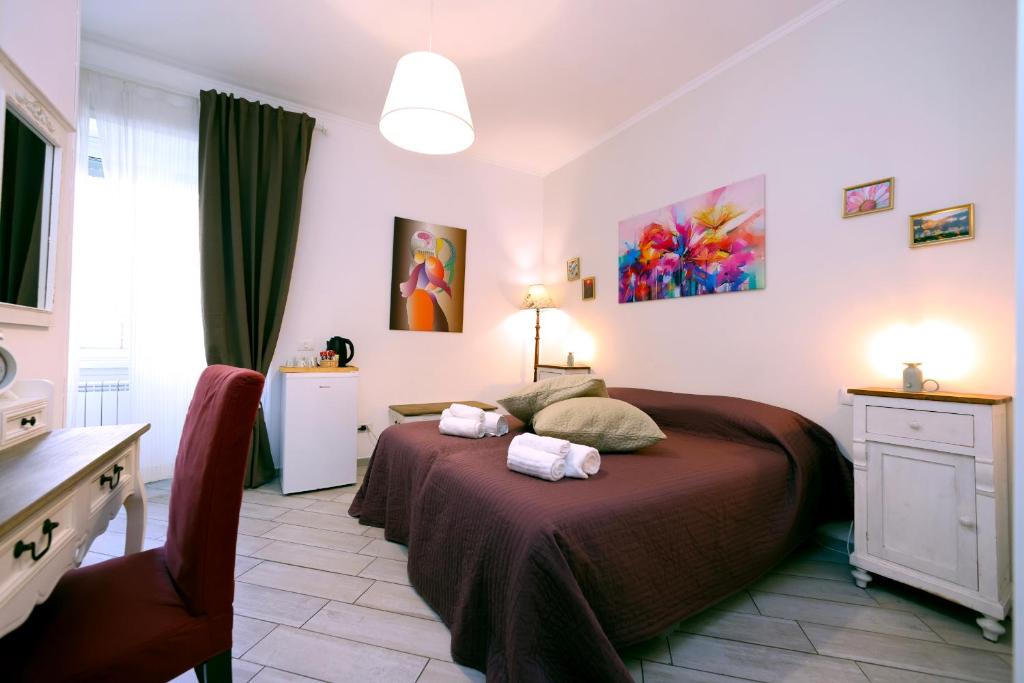 A bed or beds in a room at Sivory Rome