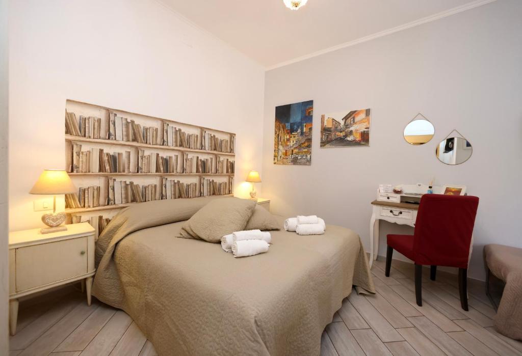 A bed or beds in a room at Sivory Rome