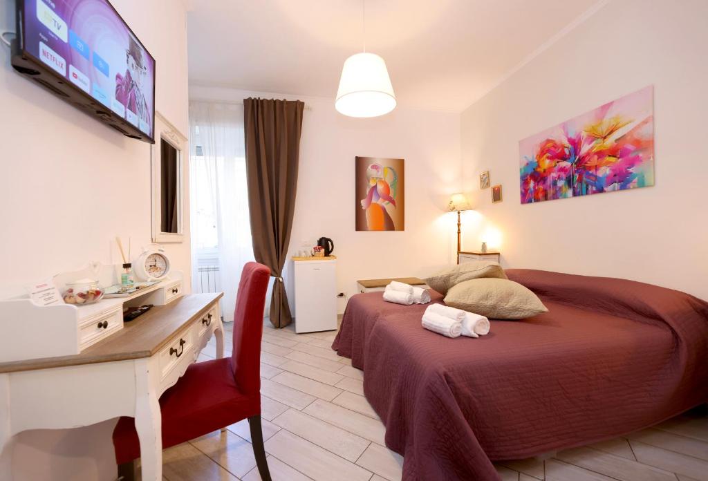 A bed or beds in a room at Sivory Rome