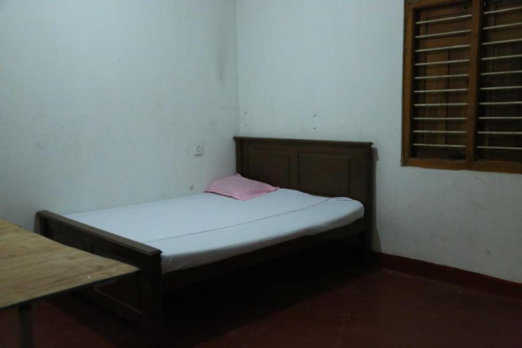 Giường trong phòng chung tại Flamingo Resort