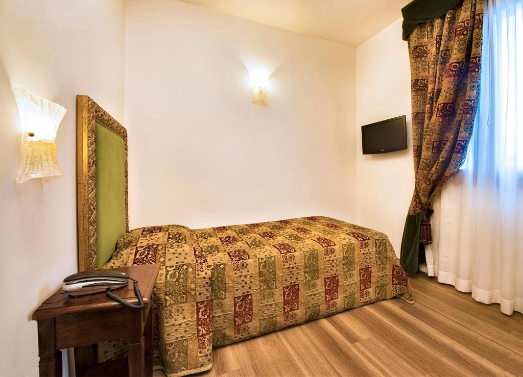 TV a/nebo společenská místnost v ubytování Hotel Giardinetto Venezia
