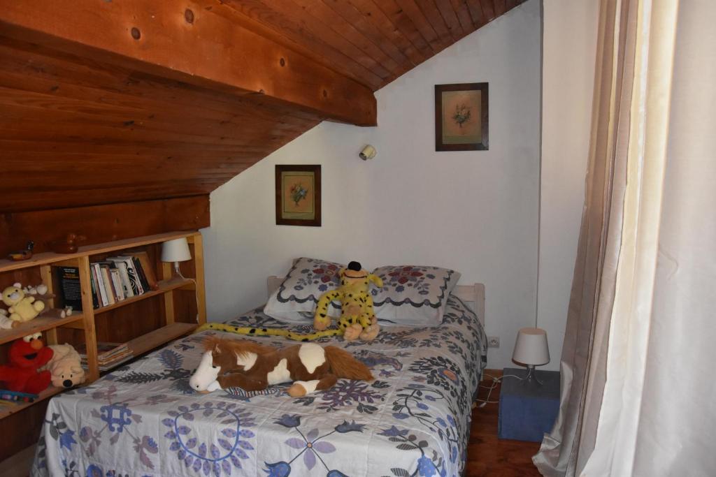 Postel nebo postele na pokoji v ubytování studio des perce neige