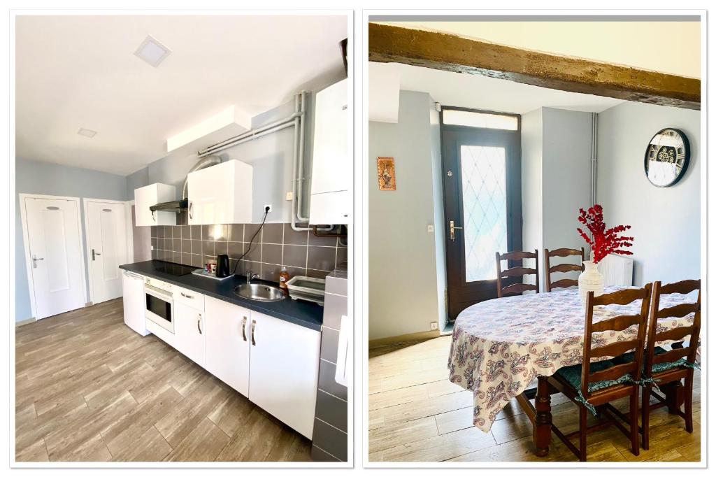 a kitchen and a dining room with a table at Appartement indépendant avec jardin in Saint-Clément