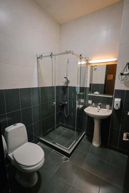Koupelna v ubytování Hotel Darchi