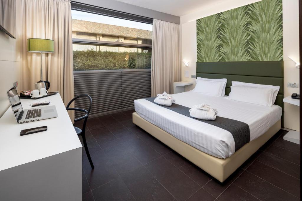 Postel nebo postele na pokoji v ubytování Best Western Hotel Green City