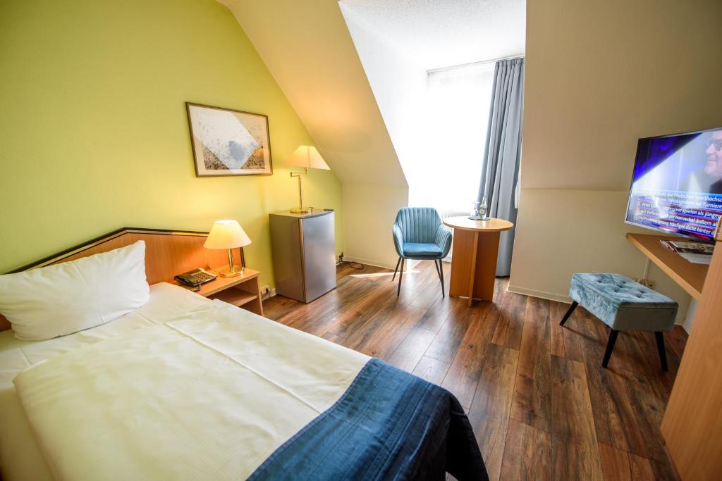 TV a/nebo společenská místnost v ubytování Residenz Hotel Leipzig