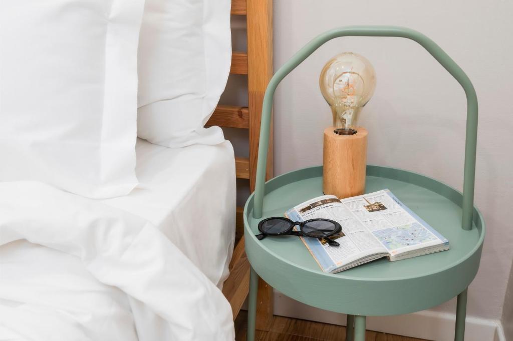 A bed or beds in a room at Trevi Fountain Apartment - ZENO 03