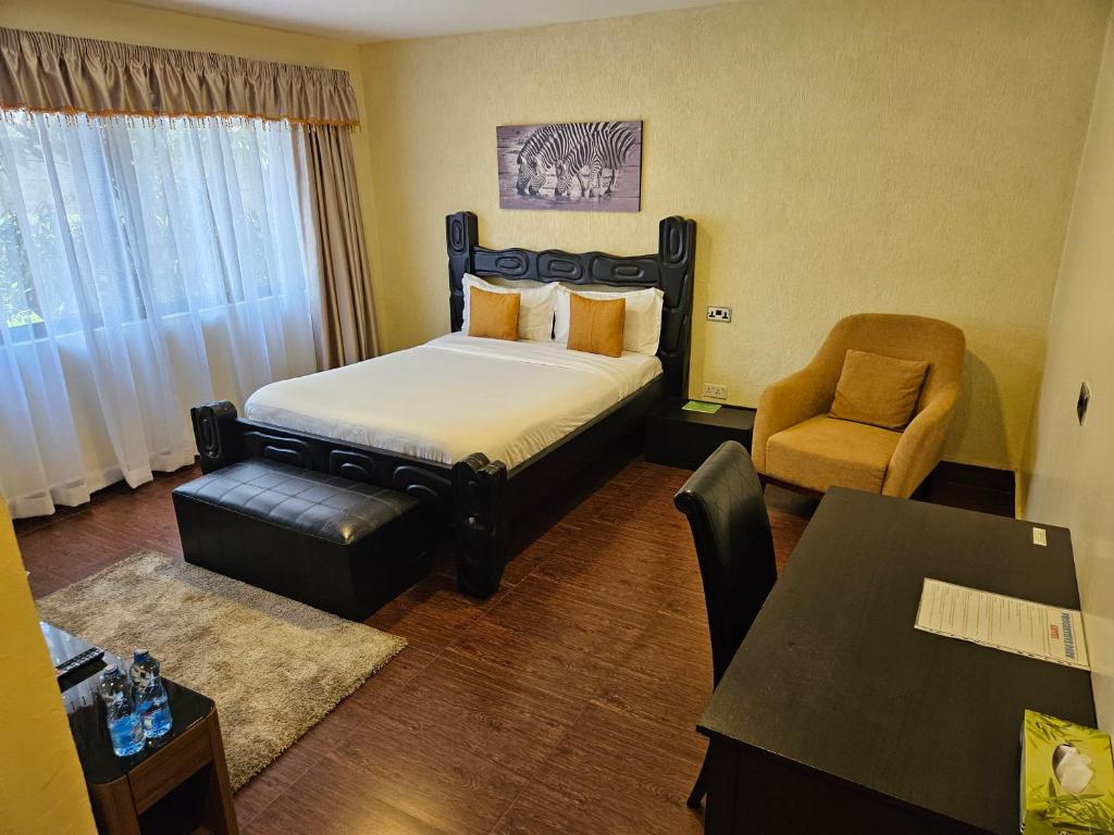 Postel nebo postele na pokoji v ubytování Progressive Park Hotel